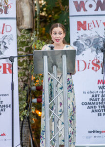 Amber-Page Moss reading from The Lyverdeep at the Pulp Idol - Firsts 2025 launch at Sefton Park Palm House.